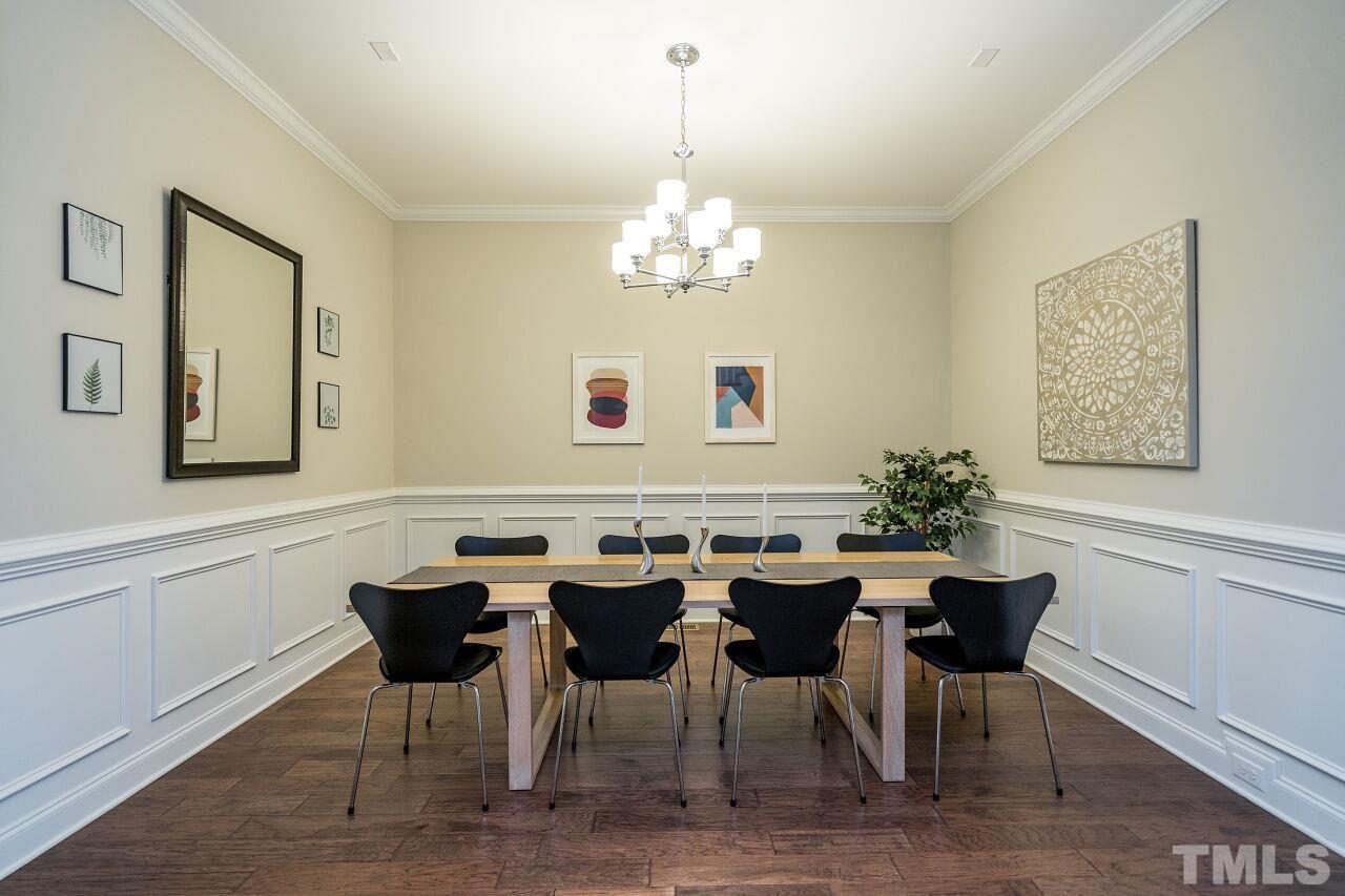 5264 Aleppo Lane Raleigh, NC 27613 - Photo 5 of 30 Enjoy entertaining with the wainscoting, generous trim and open flow.