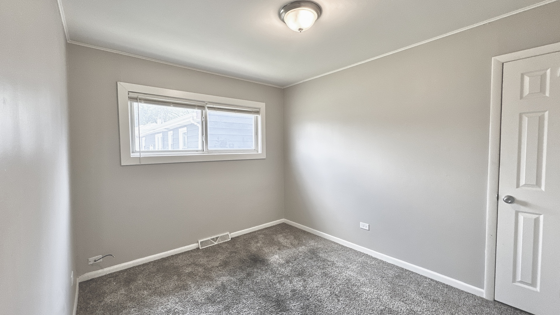 17303 Roy Street Lansing, IL 60438 - Photo 12 of 23 an empty room with windows