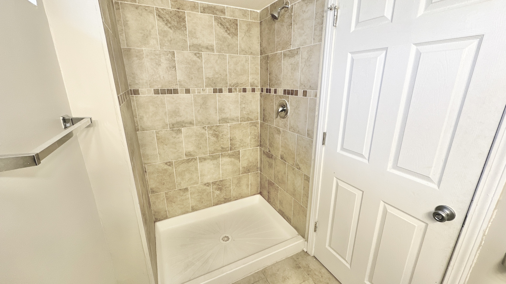 17303 Roy Street Lansing, IL 60438 - Photo 16 of 23 a bathroom with a shower and toilet
