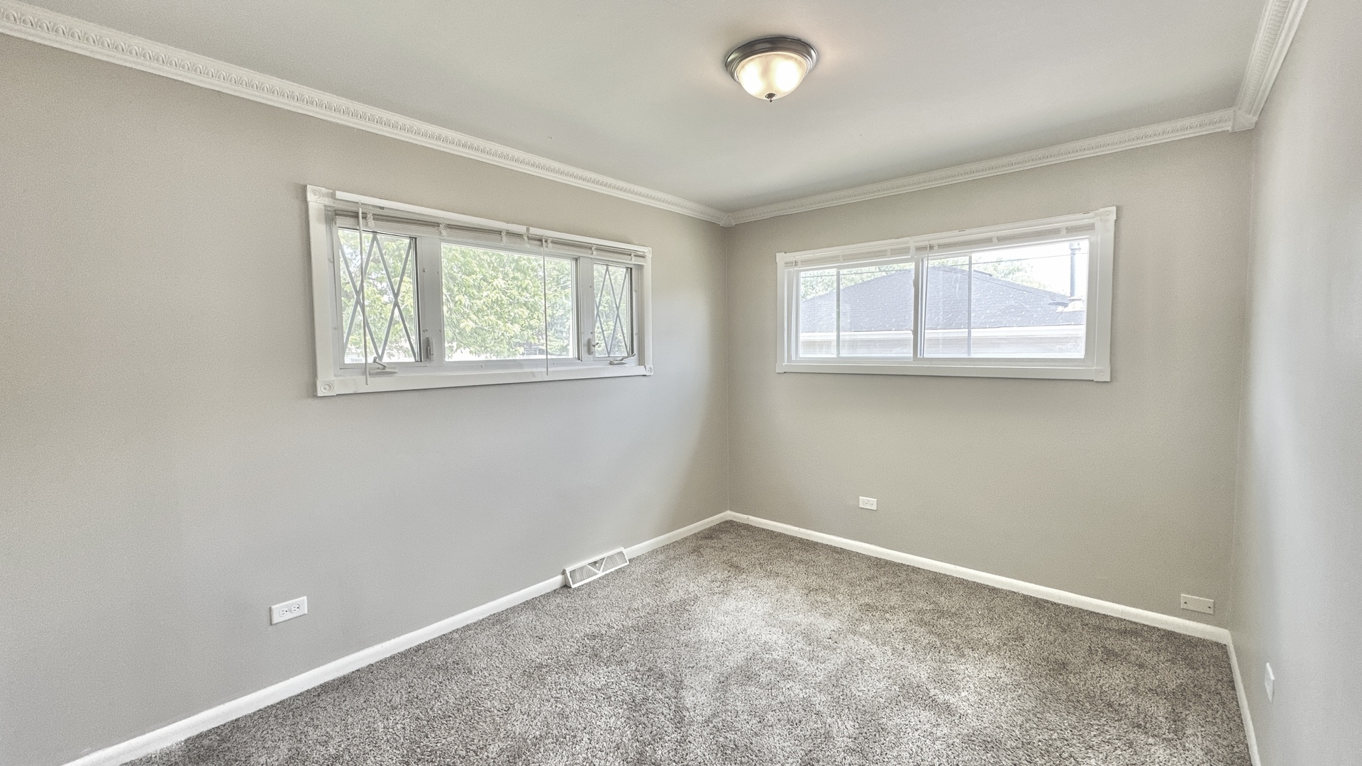 17303 Roy Street Lansing, IL 60438 - Photo 10 of 23 an empty room with windows