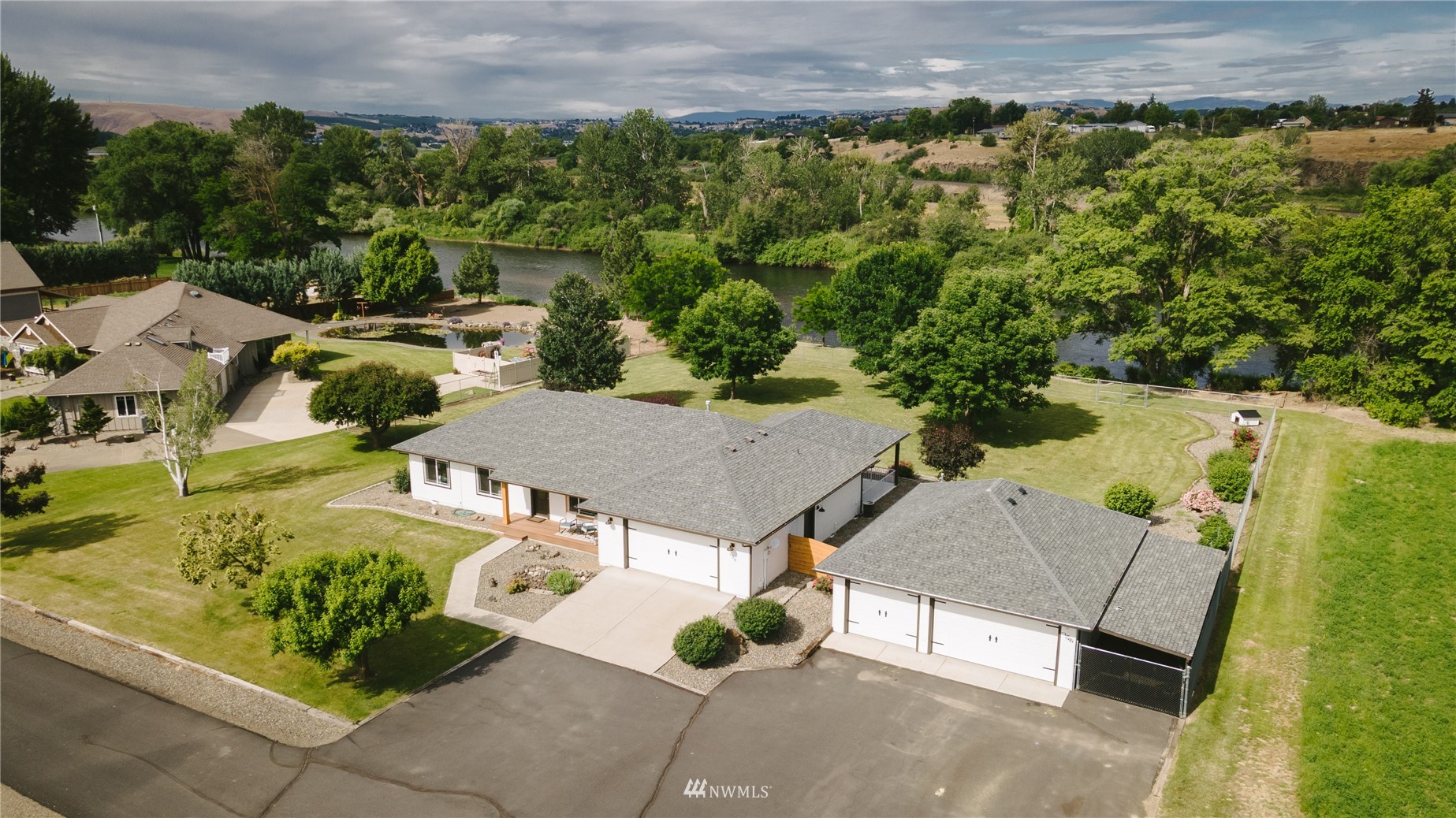 250 Rivers Edge Lane Yakima, WA 98901 - Photo 1 of 40 an aerial view of a house with garden space and street view