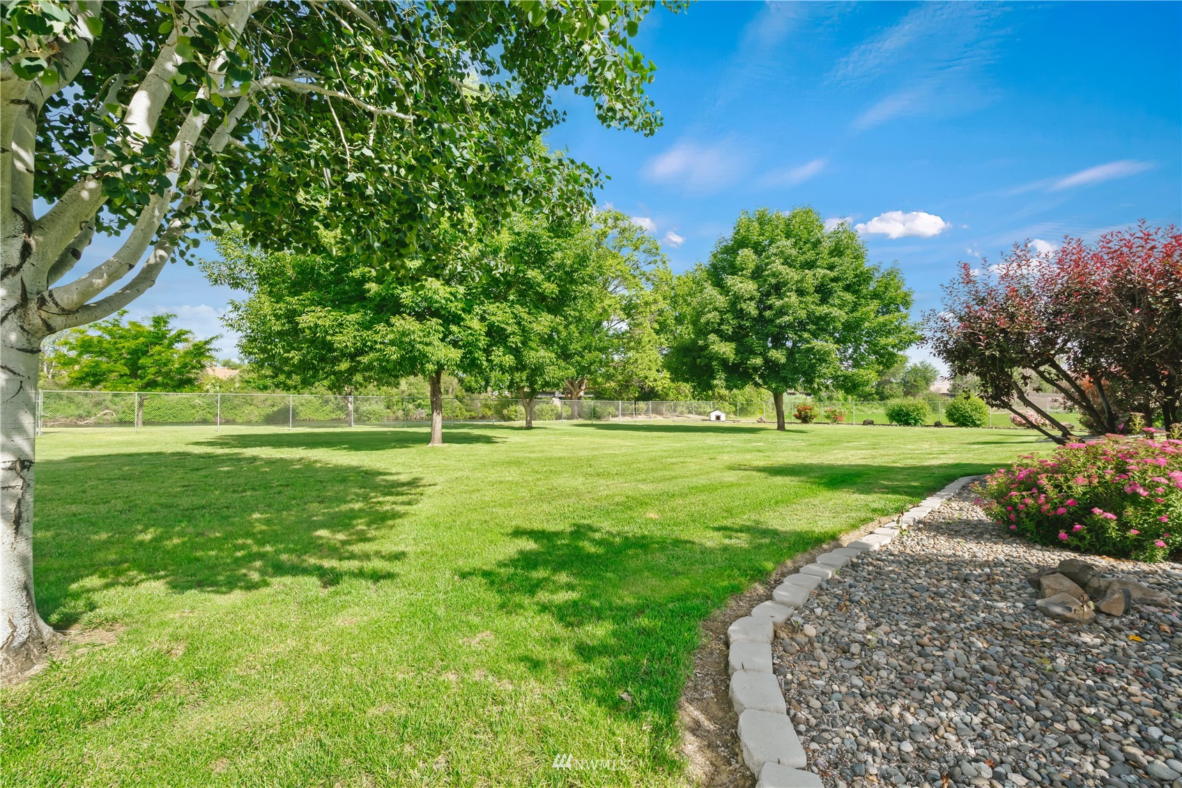 250 Rivers Edge Lane Yakima, WA 98901 - Photo 34 of 40 a view of a park with large trees