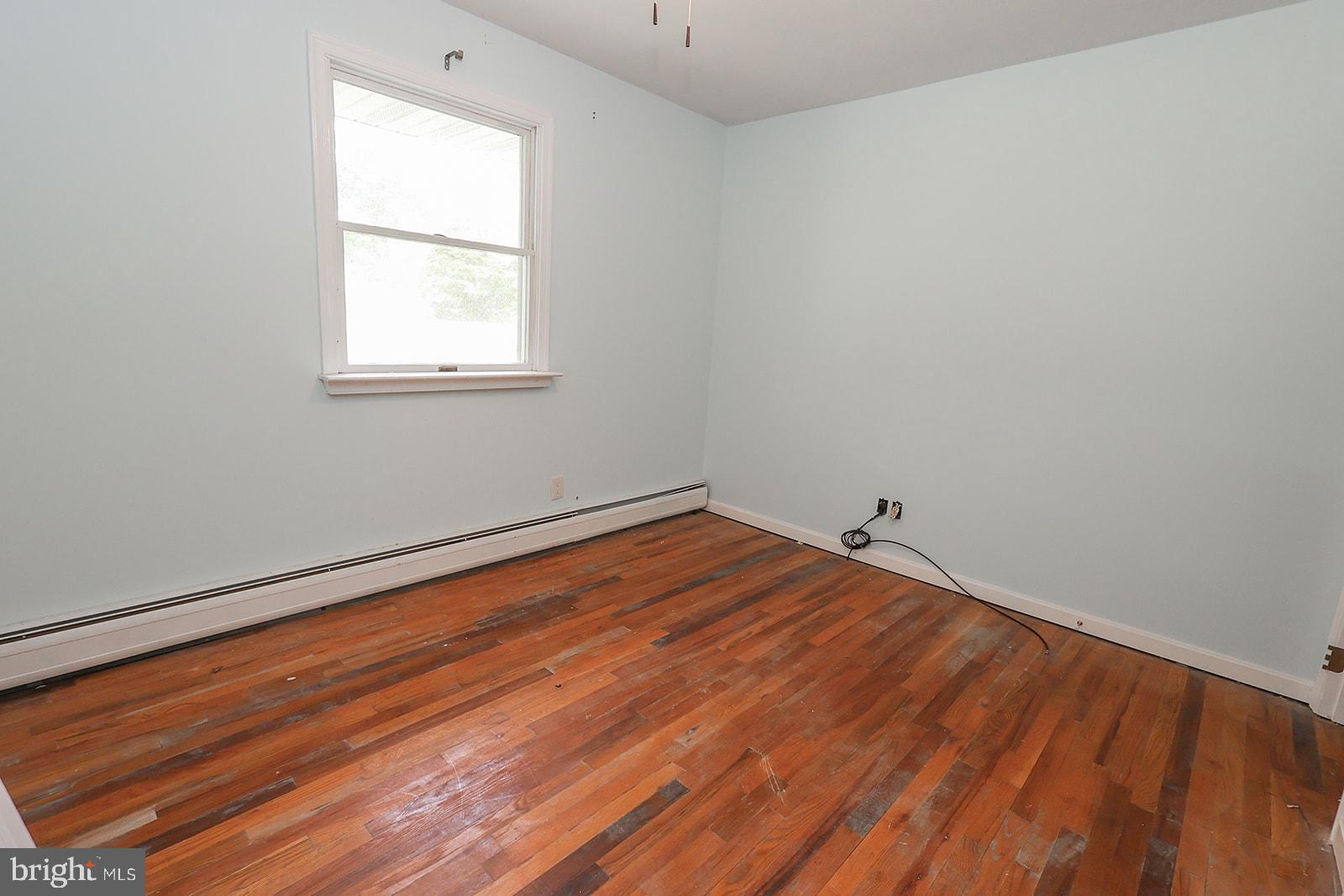 48146 Mallard View Lane St. Inigoes, MD 20684 - Photo 29 of 46 Bright, airy room with hardwood floors.