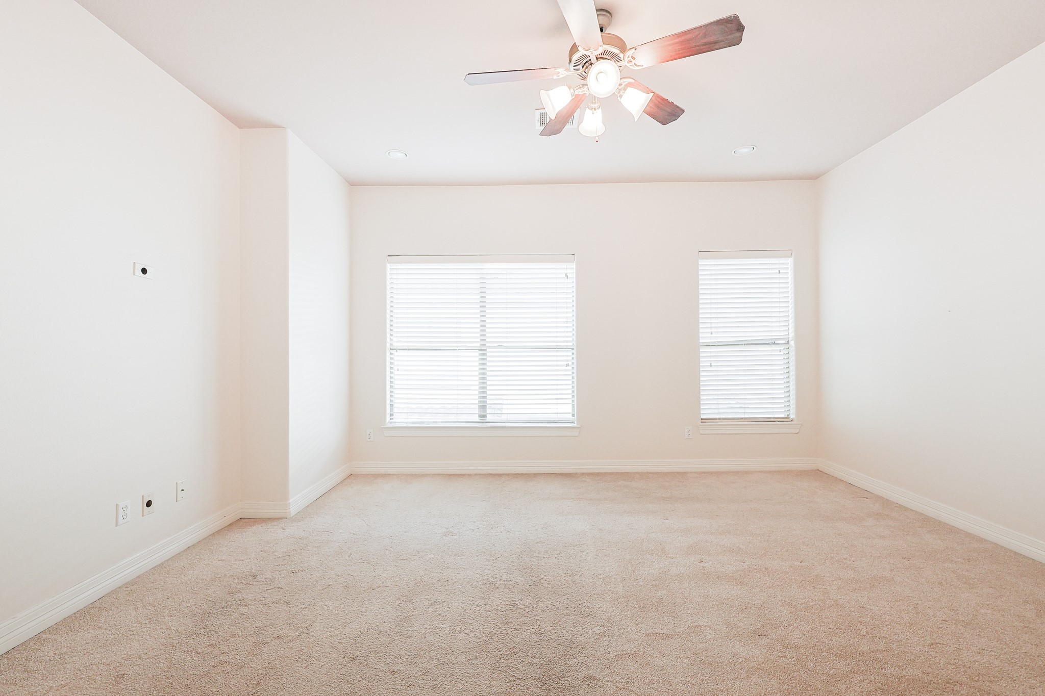 2540 Prospect Street, Unit C Houston, TX 77004 - Photo 23 of 31 an empty room with windows and fan