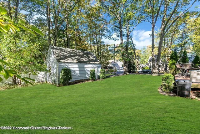 a view of a chairs and table in the patio