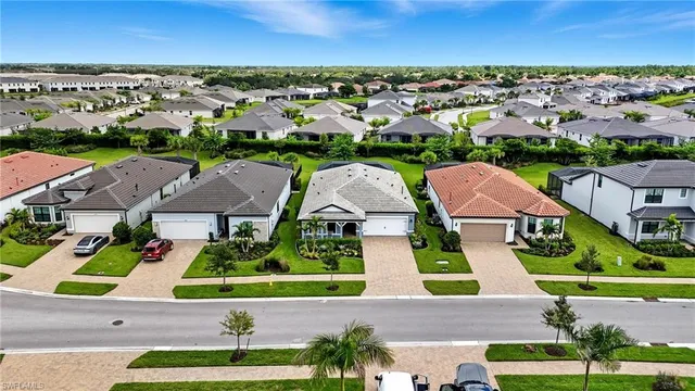an aerial view of house with yard