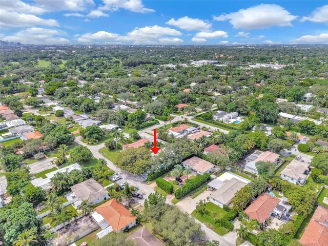 a view of a backyard with a garden