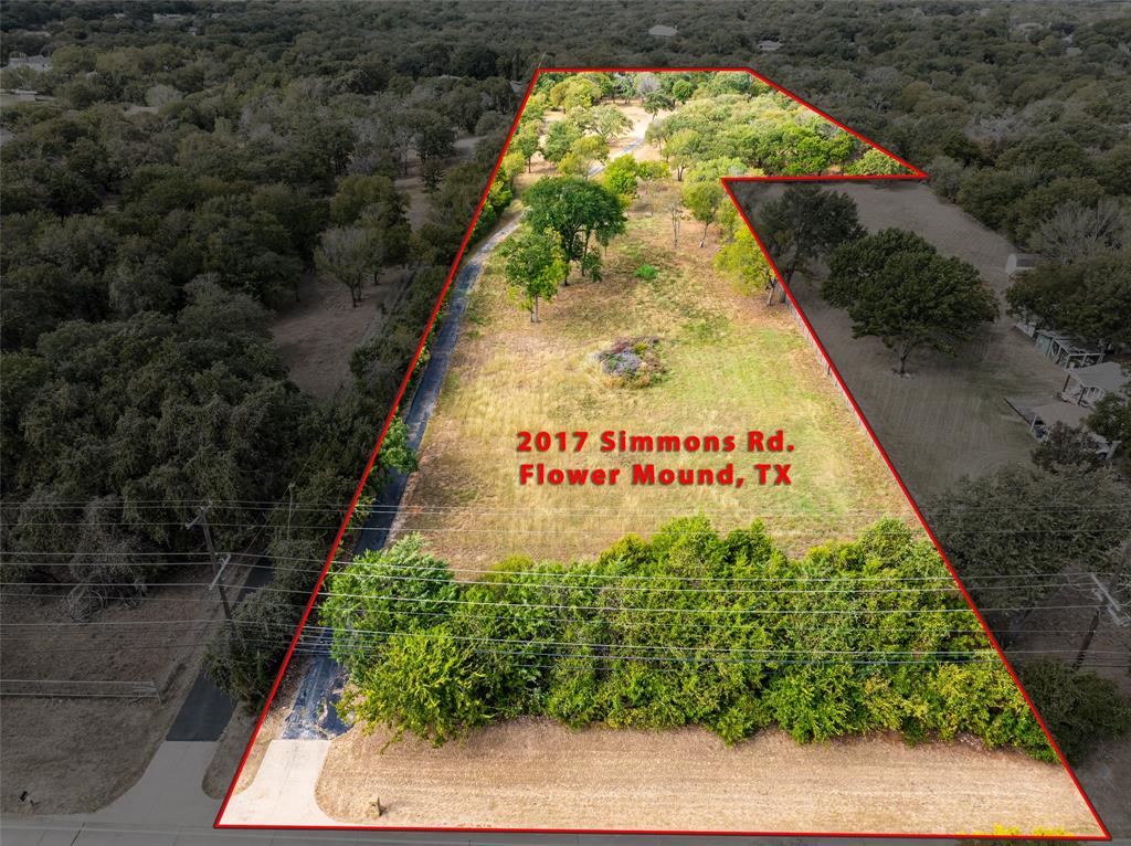 2017 Simmons Road Flower Mound, TX 75022 - Photo 3 of 11 a sign that is on the side of a building