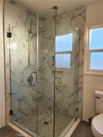 a view of a house with a back yard