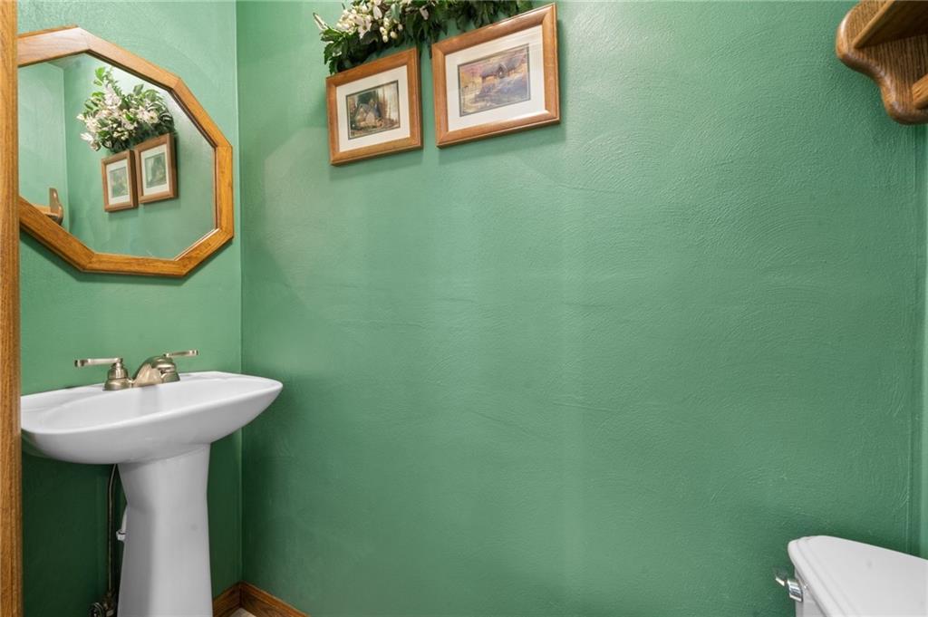 338 Hellein School Road Donegal, PA 15628 - Photo 24 of 46 a bathroom with a sink mirror and toilet