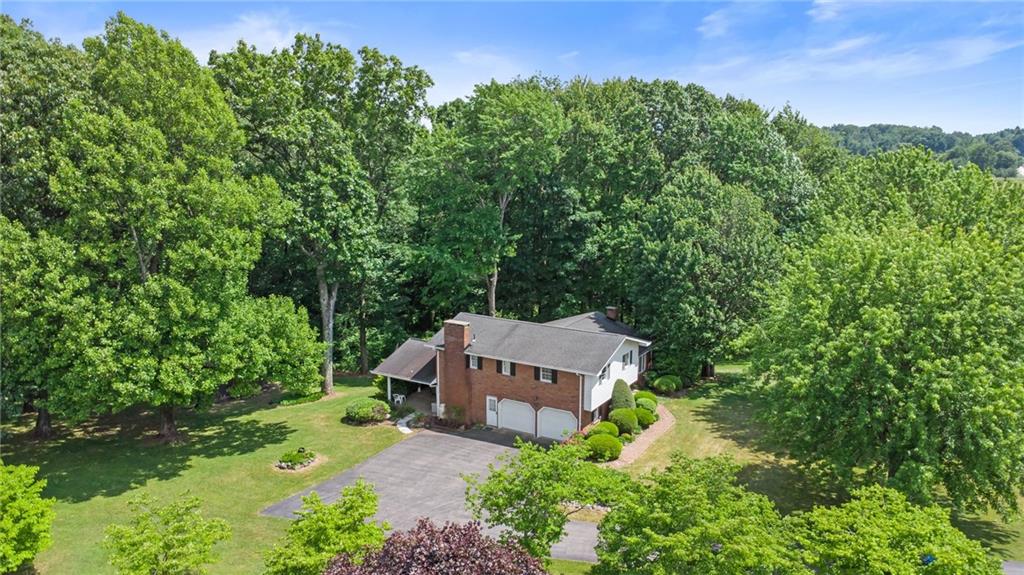 338 Hellein School Road Donegal, PA 15628 - Photo 3 of 46 an aerial view of a house with a yard