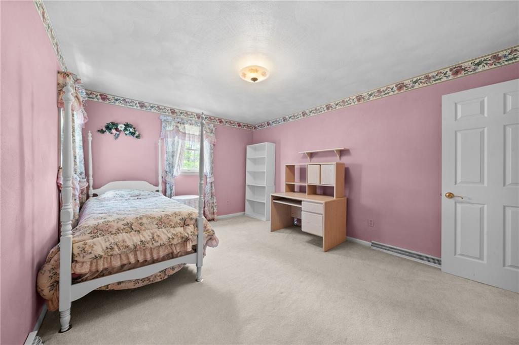 338 Hellein School Road Donegal, PA 15628 - Photo 32 of 46 a spacious bedroom with a bed and dresser