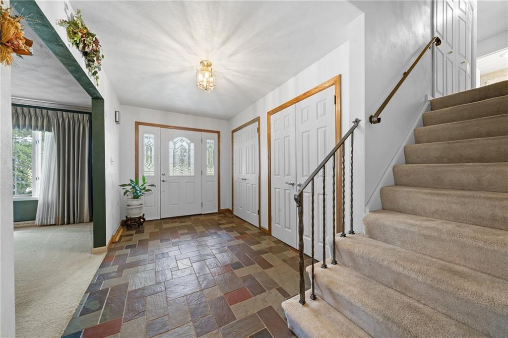 338 Hellein School Road Donegal, PA 15628 - Photo 7 of 46 a view of a hallway with wooden floor and entryway