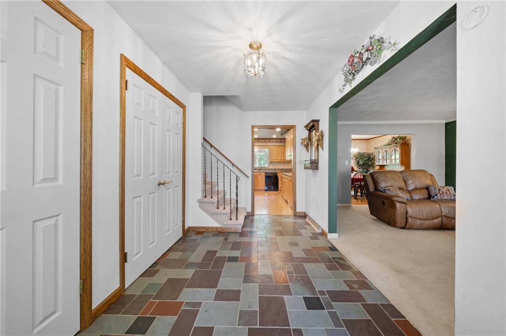 338 Hellein School Road Donegal, PA 15628 - Photo 8 of 46 a view of a hallway with furniture and a livingroom