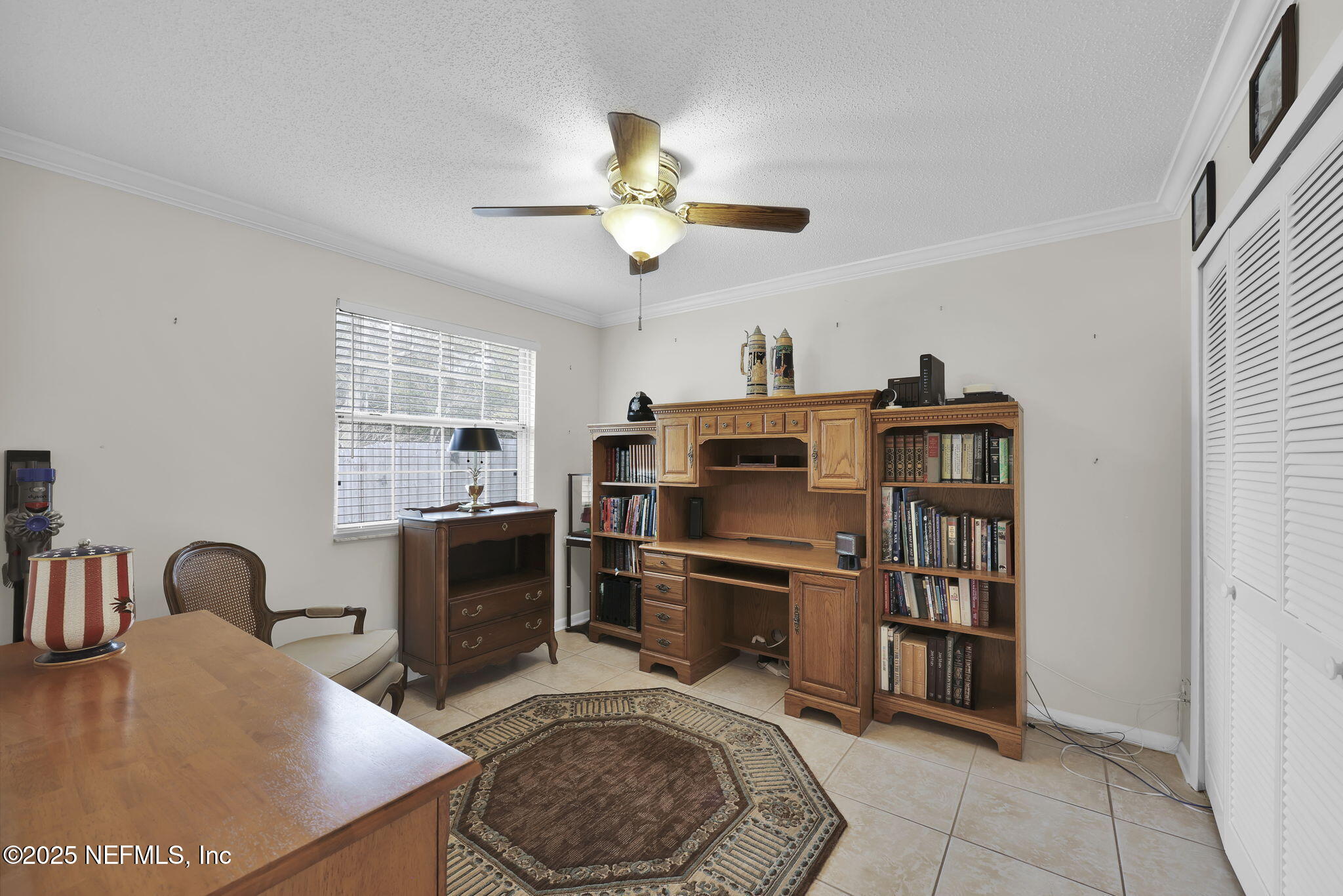 4607 Seaboard Avenue Jacksonville, FL 32210 - Photo 11 of 18 a living room with furniture and a fireplace