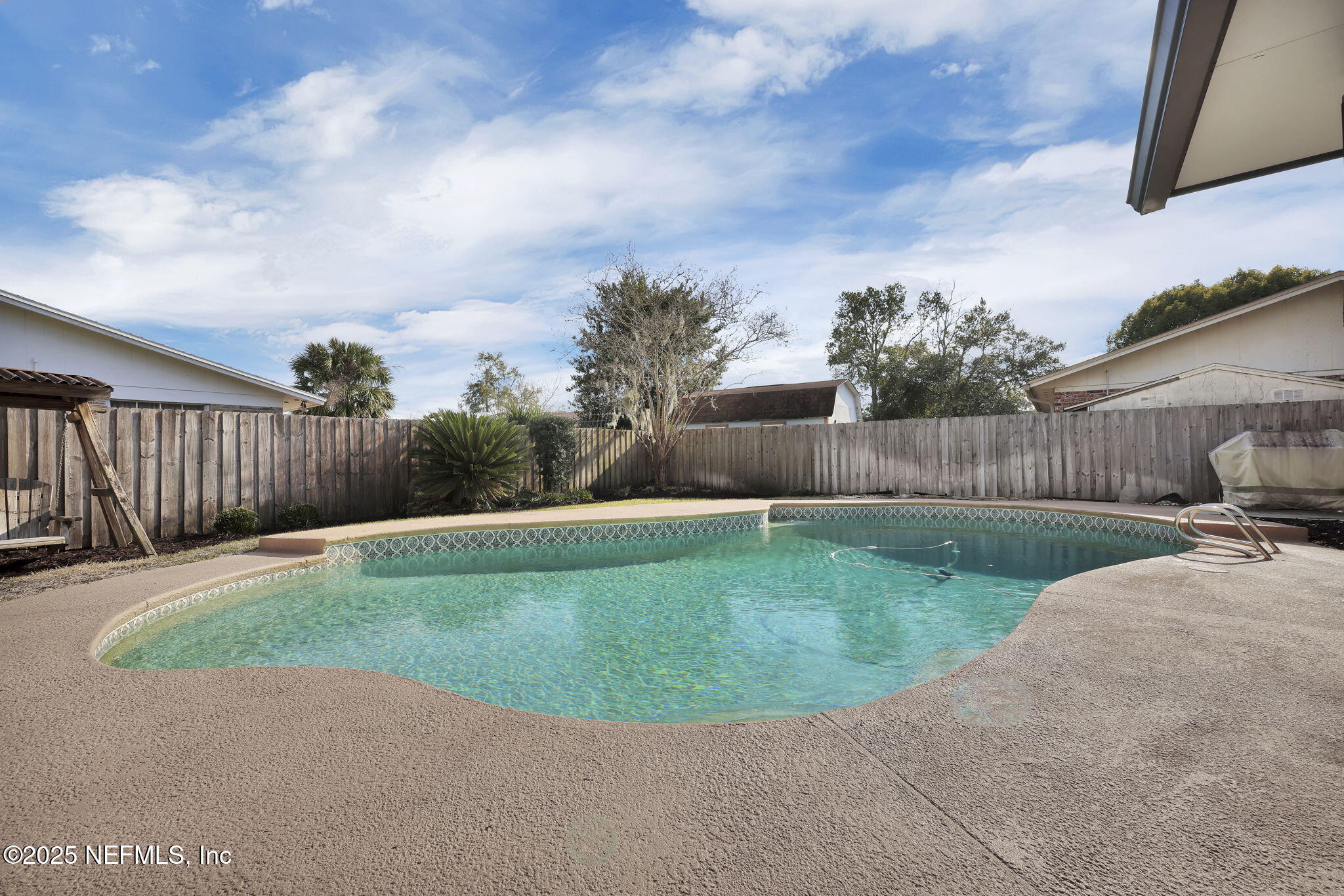 4607 Seaboard Avenue Jacksonville, FL 32210 - Photo 17 of 18 a view of a backyard with iron fence
