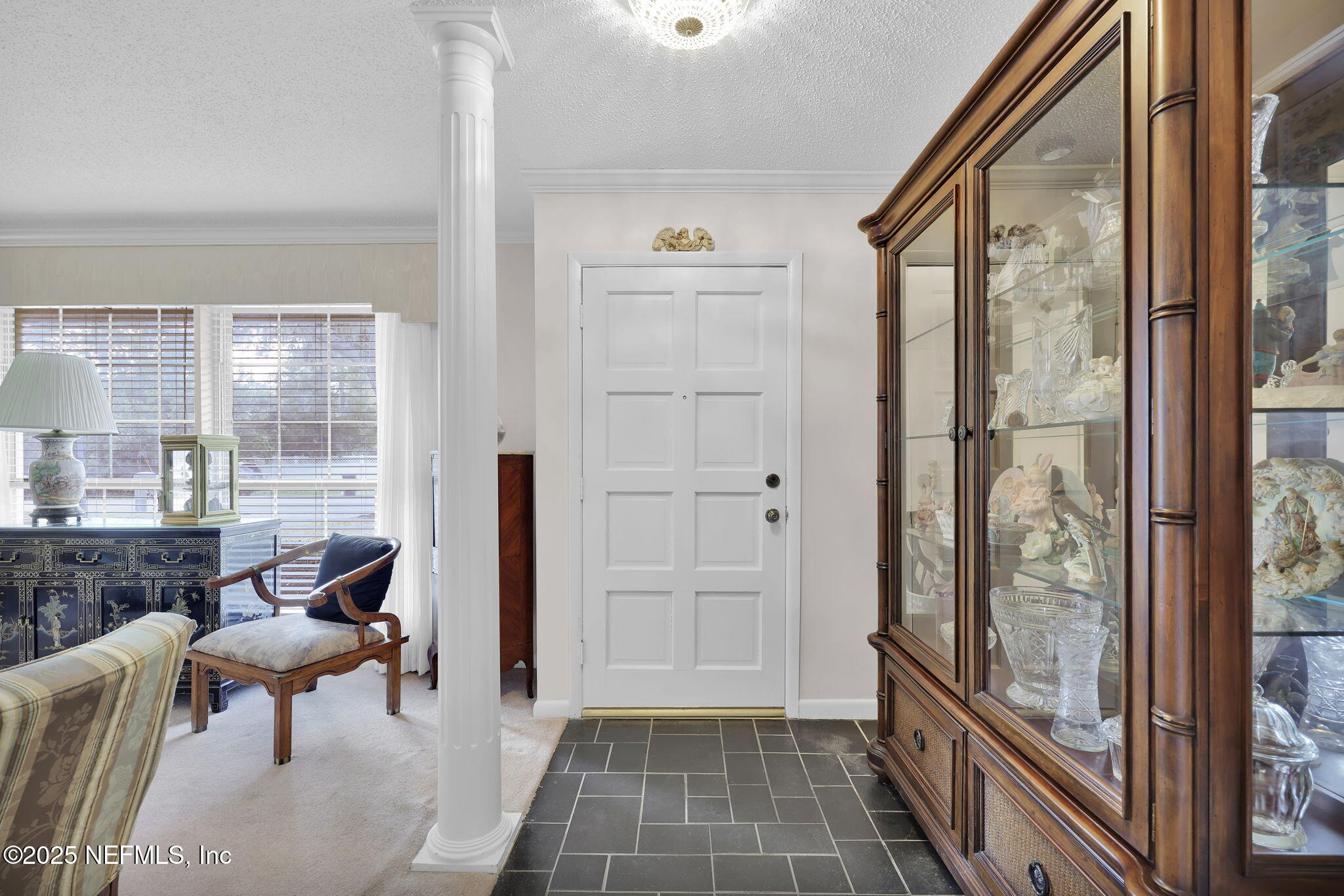 4607 Seaboard Avenue Jacksonville, FL 32210 - Photo 3 of 18 a living room with furniture and a large window