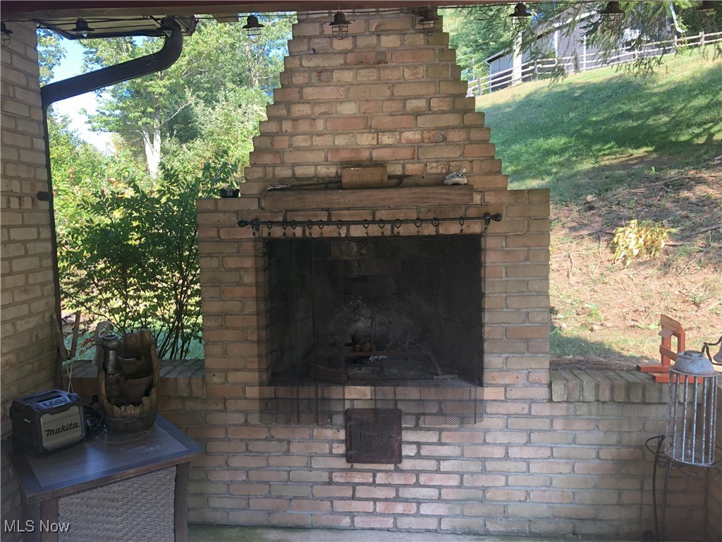6728 Wolf Run Road Southeast Dennison, OH 44621 - Photo 45 of 47 fireplace patio