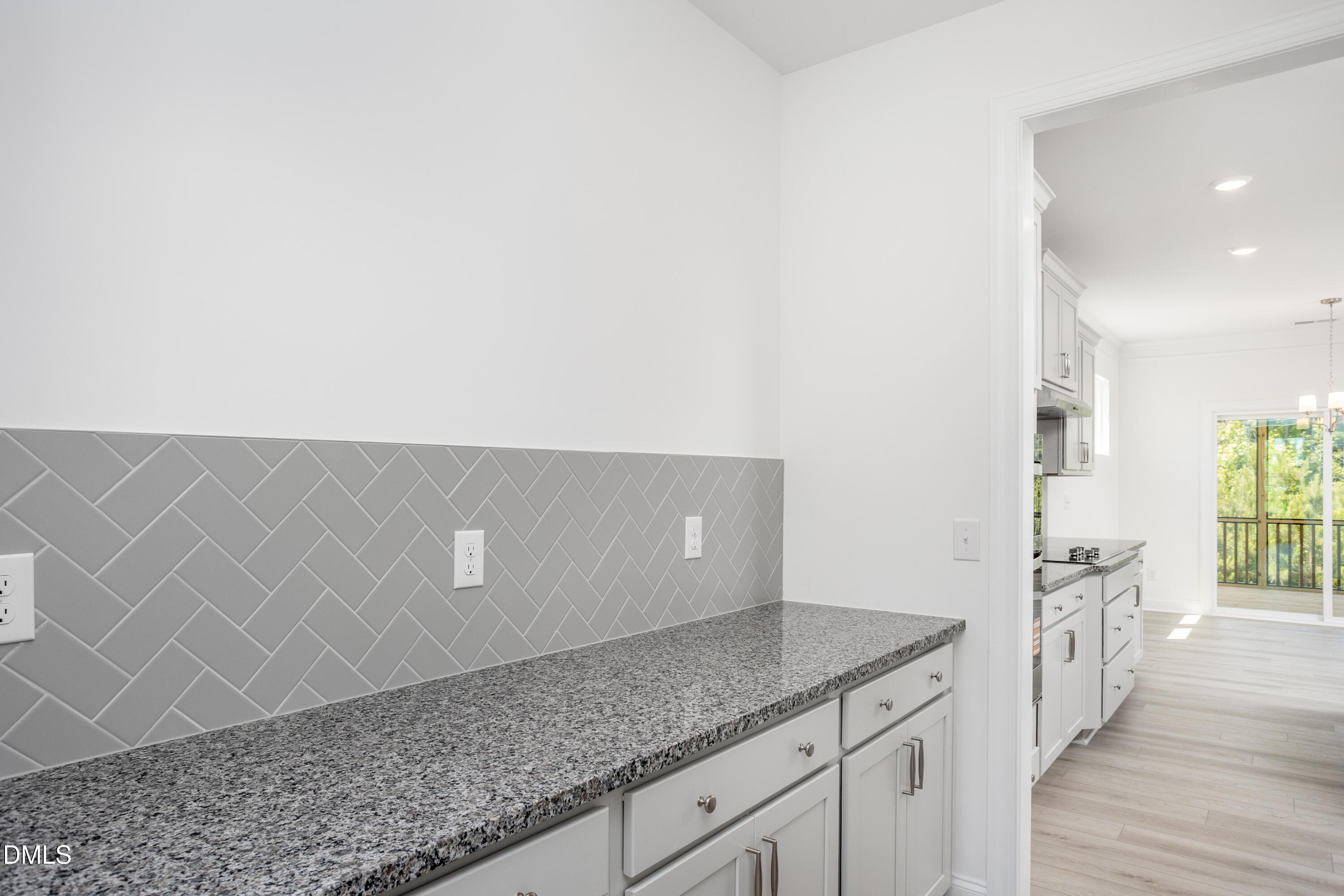 216 Cedar Rdg Trail Angier, NC 27501 - Photo 7 of 33 a kitchen with a sink and cabinets