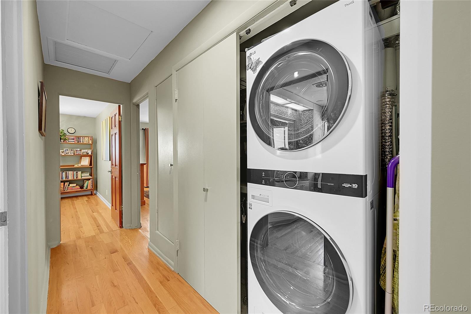 1500 West Ridge Road Littleton, CO 80120 - Photo 16 of 49 a view of a hallway with washer and dryer