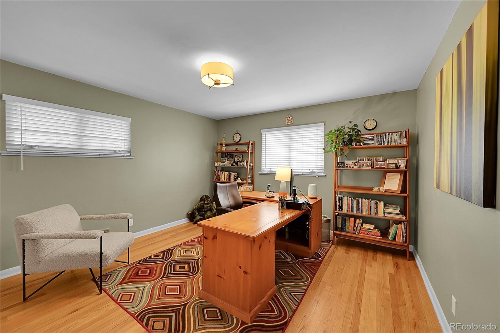 1500 West Ridge Road Littleton, CO 80120 - Photo 17 of 49 a dining room with a table and chairs