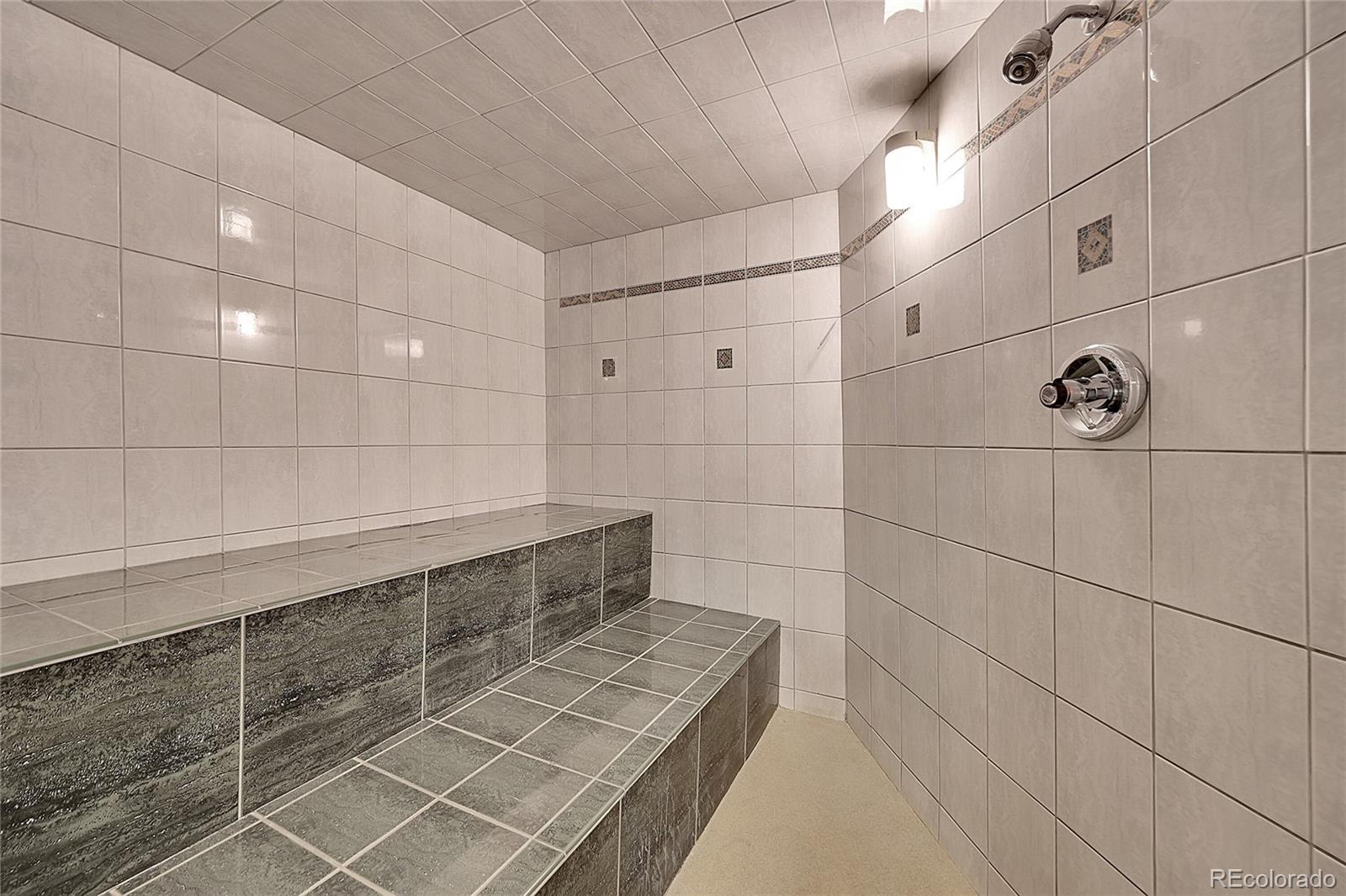 1500 West Ridge Road Littleton, CO 80120 - Photo 23 of 49 a bathroom with a shower
