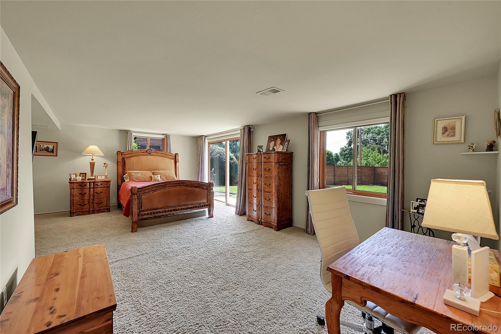 1500 West Ridge Road Littleton, CO 80120 - Photo 26 of 49 a bed room with furniture and a window