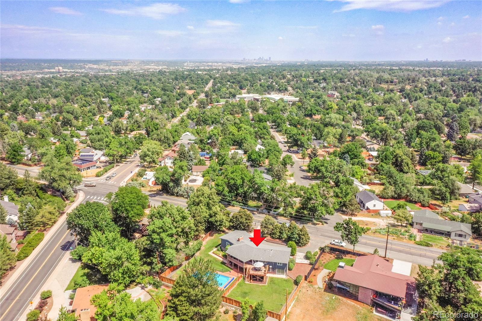 1500 West Ridge Road Littleton, CO 80120 - Photo 46 of 49 an aerial view of residential houses with outdoor space and trees