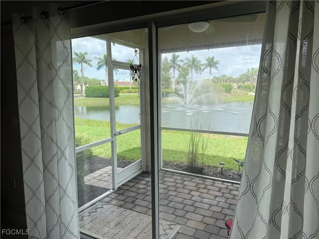 a view of a room with a large window