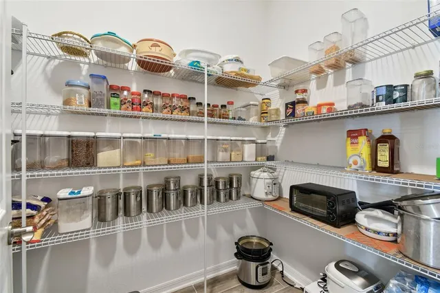 a living room with furniture rug and window