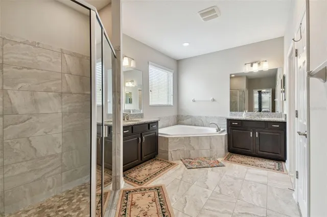 a bathroom with a bathtub and a toilet