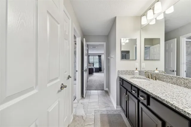 a aerial view of a house with a yard