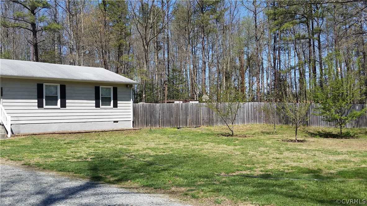 9420 Cosby Mill Road Quinton, VA 23141 - Photo 3 of 19 a backyard of a house with lots of green space