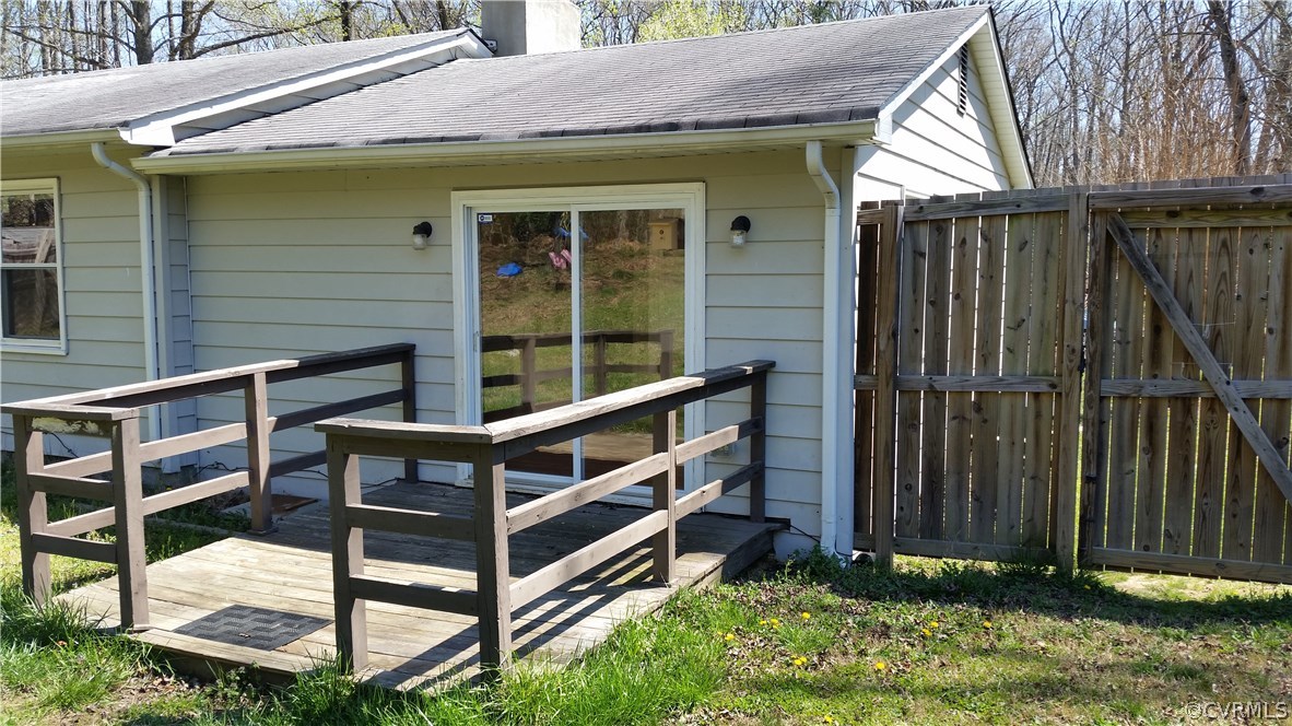 9420 Cosby Mill Road Quinton, VA 23141 - Photo 5 of 19 a view of backyard with deck and outdoor seating