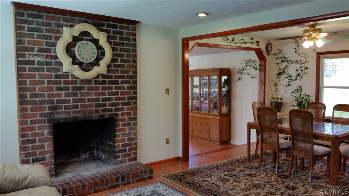 9420 Cosby Mill Road Quinton, VA 23141 - Photo 8 of 19 a living room with furniture and a fireplace