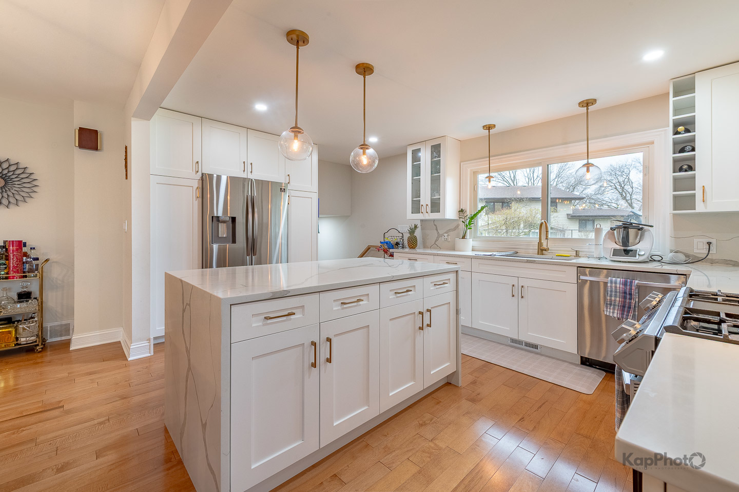 333 Bramble Lane Schaumburg, IL 60193 - Photo 11 of 33 a kitchen with white cabinets and white appliances