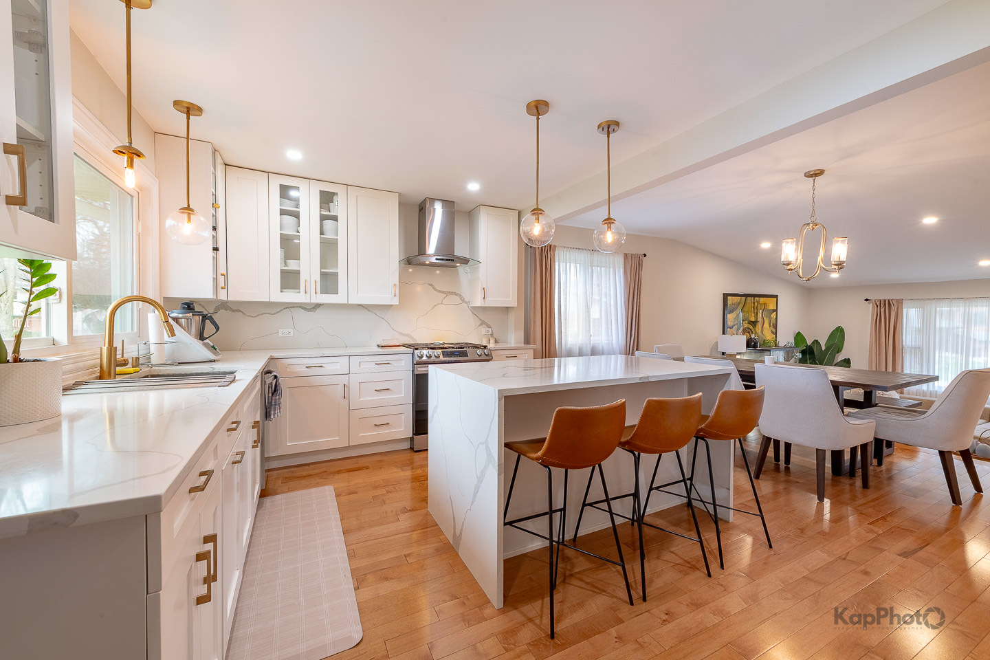 333 Bramble Lane Schaumburg, IL 60193 - Photo 12 of 33 a large kitchen with lots of counter space and stainless steel appliances