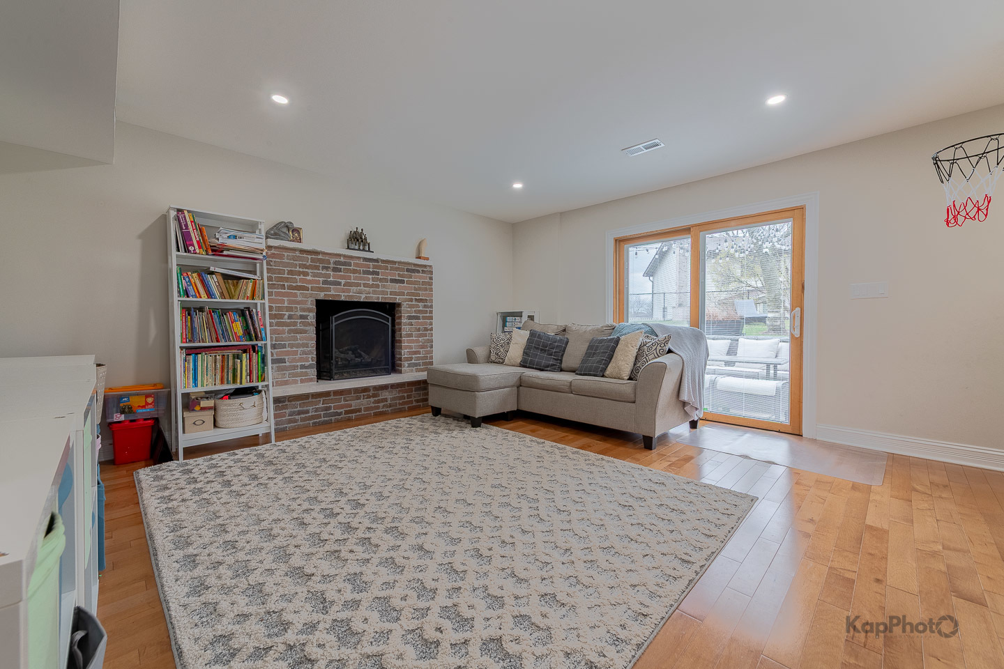 333 Bramble Lane Schaumburg, IL 60193 - Photo 14 of 33 a living room with furniture and a fireplace