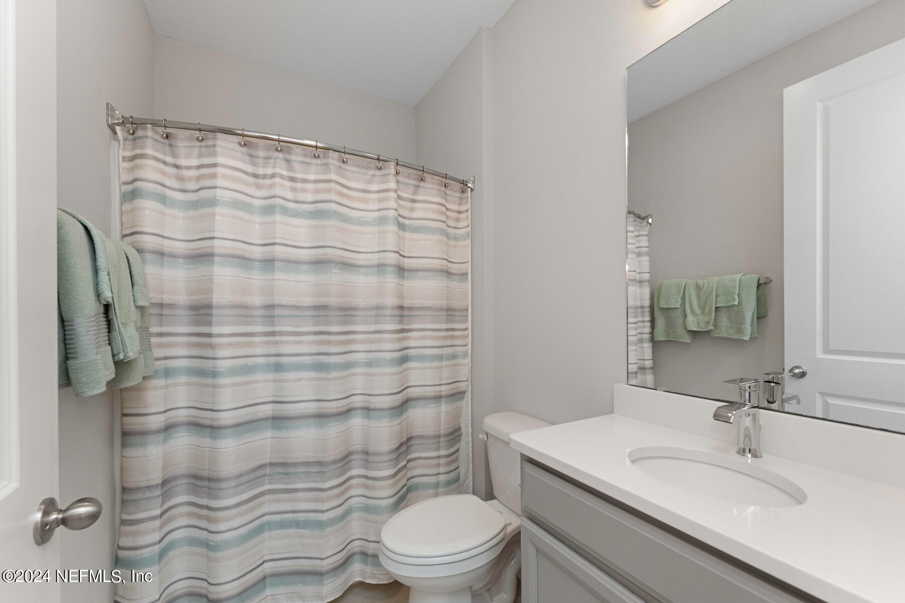 10279 Innovation Way Jacksonville, FL 32256 - Photo 25 of 42 a bathroom with a sink toilet and shower