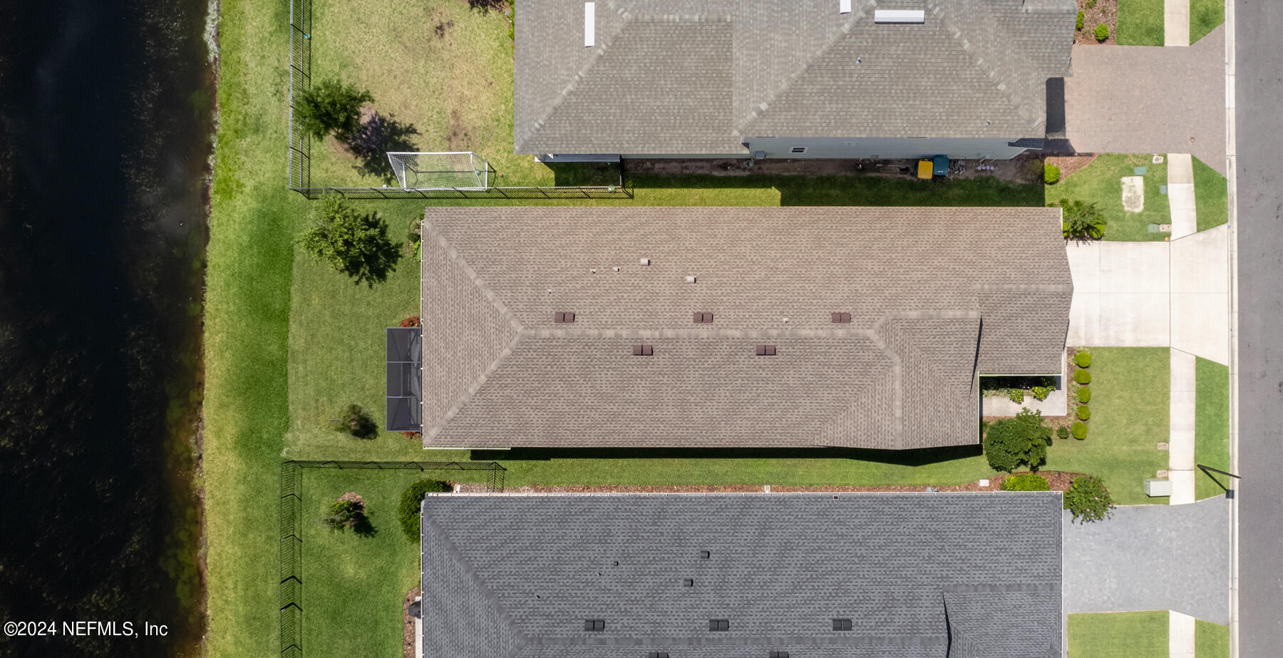 10279 Innovation Way Jacksonville, FL 32256 - Photo 32 of 42 an aerial view of a house with a yard