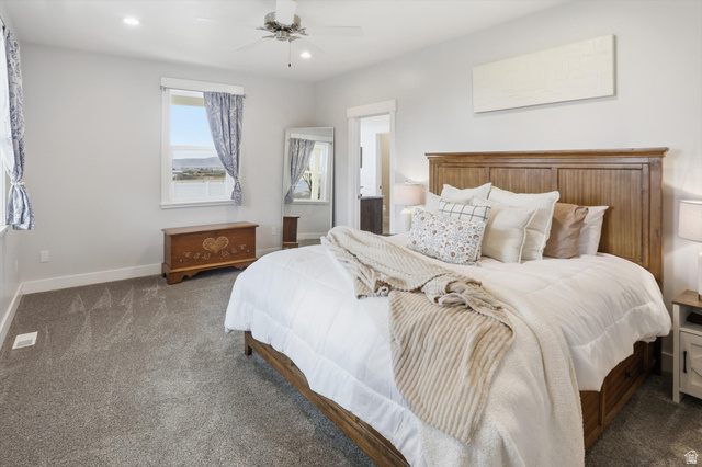 1009 High Creek Road Cove, UT 84320 - Photo 27 of 79 Primary Bedroom featuring carpet floors, ceiling fan, ensuite bath, and recessed lighting