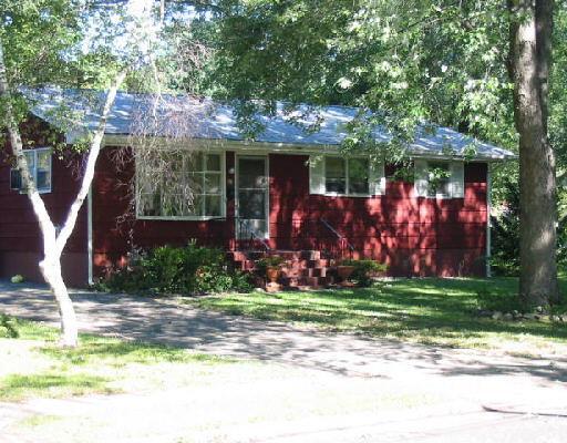 50 Valley View Road Milford, CT 06461 - Photo 1 of 1 a front view of a house with garden