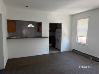 13 Jefferson Avenue, Unit 2 New London, CT 06320 - Photo 2 of 5 a view of a livingroom with a dishwasher