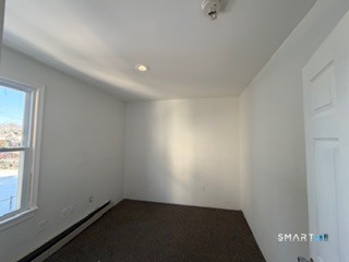 13 Jefferson Avenue, Unit 2 New London, CT 06320 - Photo 5 of 5 an empty room with a window