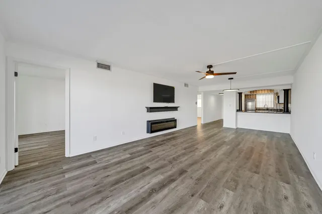 a bedroom with a bed and a desk