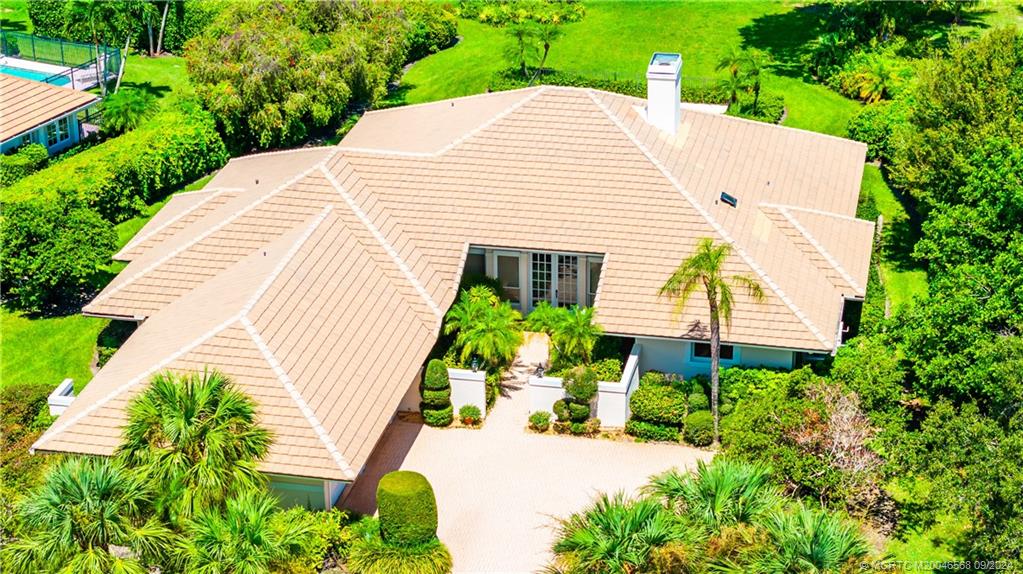 Undisclosed Address Stuart, FL 34997 - Photo 5 of 52 a aerial view of a house