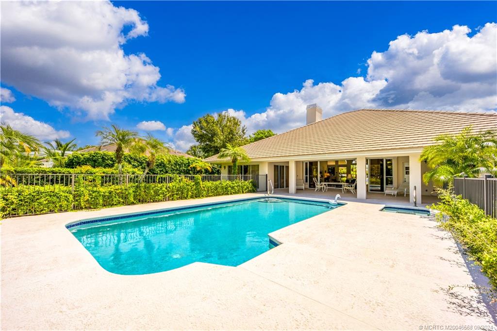 Undisclosed Address Stuart, FL 34997 - Photo 51 of 52 a view of a swimming pool and a fountain