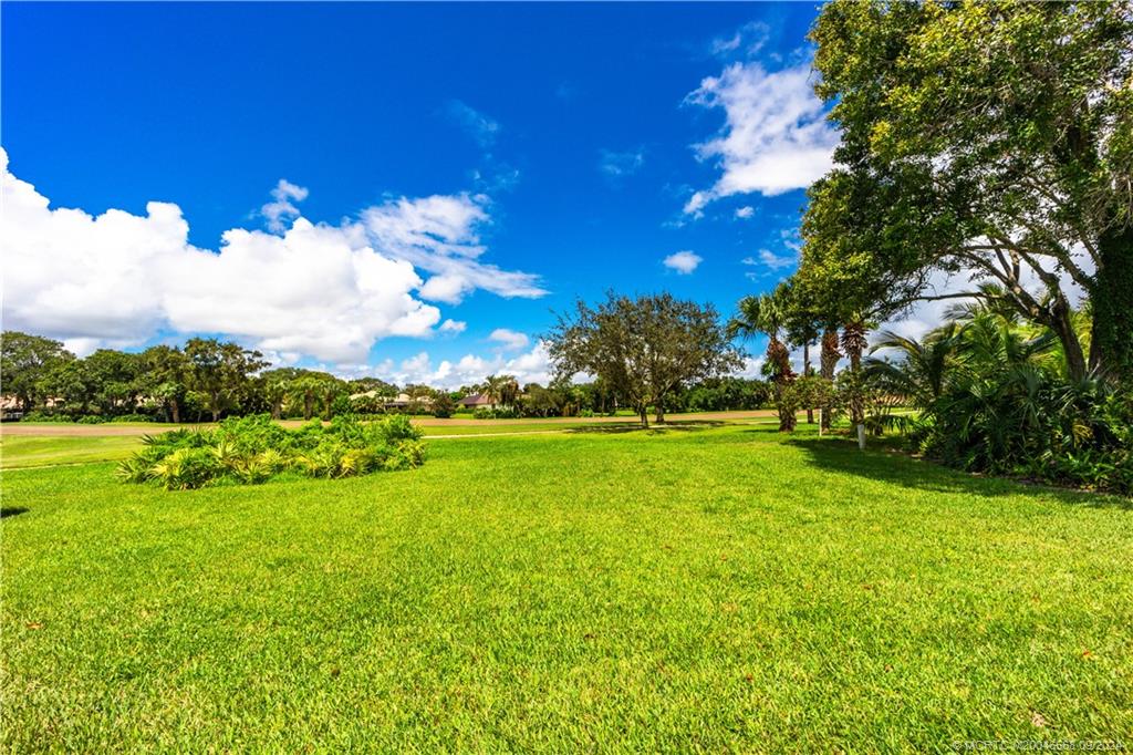 Undisclosed Address Stuart, FL 34997 - Photo 52 of 52 a view of yard with swimming pool and green space