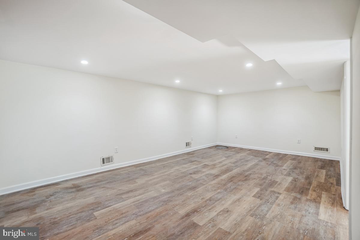 4710 Red Fox Road Rockville, MD 20852 - Photo 19 of 28 Lower level rec room