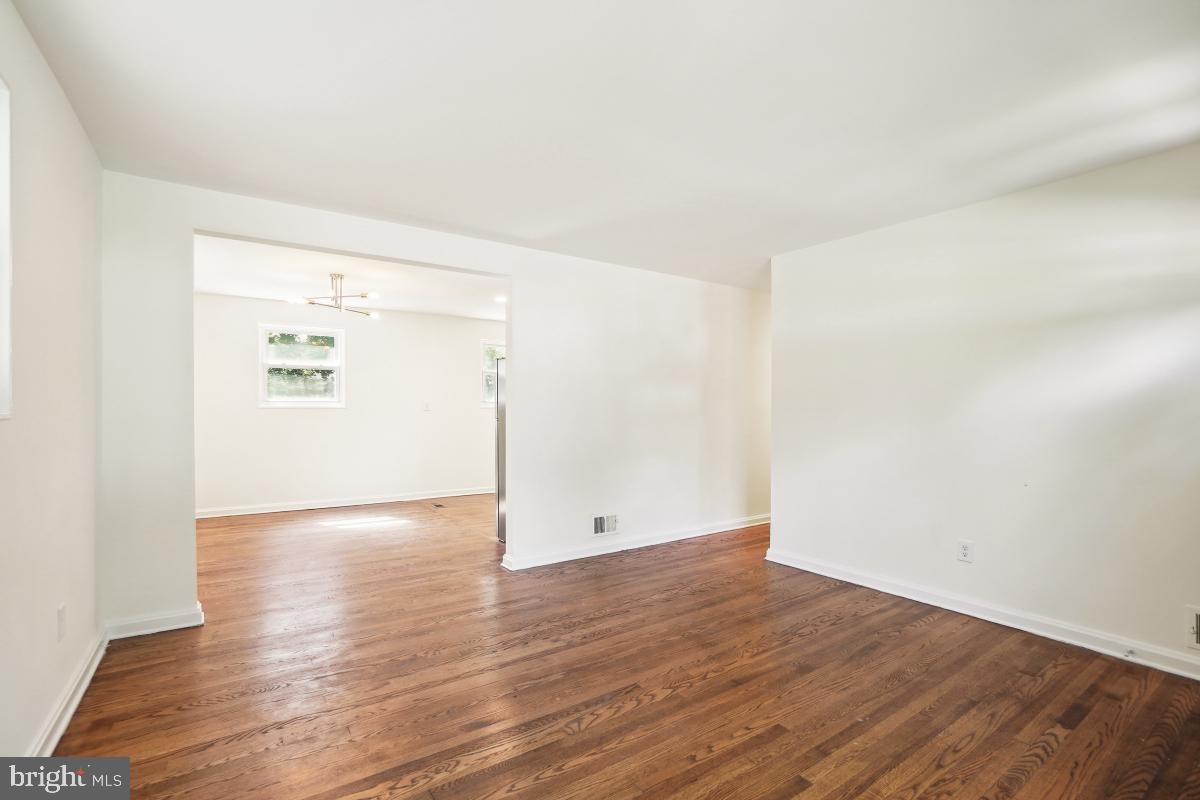 4710 Red Fox Road Rockville, MD 20852 - Photo 3 of 28 Hardwood floors in living room and first floor